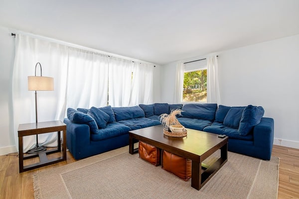Comfortable home in a great location with enclosed yard, family room, & kayaks