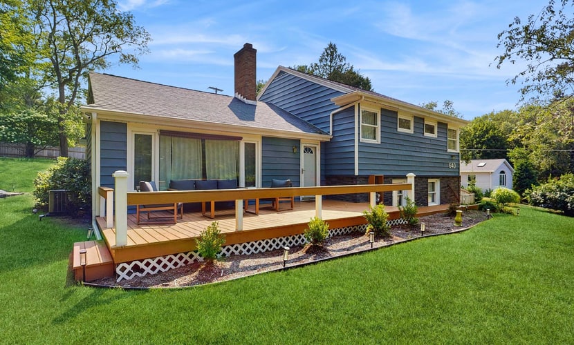 Comfortable home in a great location with enclosed yard, family room, & kayaks