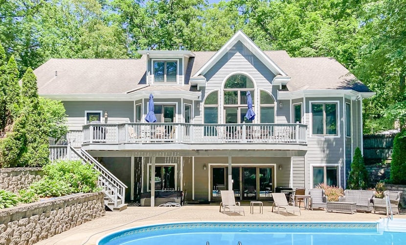 Airy home with private pool, hot tub, big game room, & golf cart - walk to beach