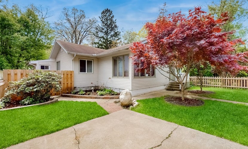 Dog-friendly home in the perfect location with enclosed yard, streaming, & W/D