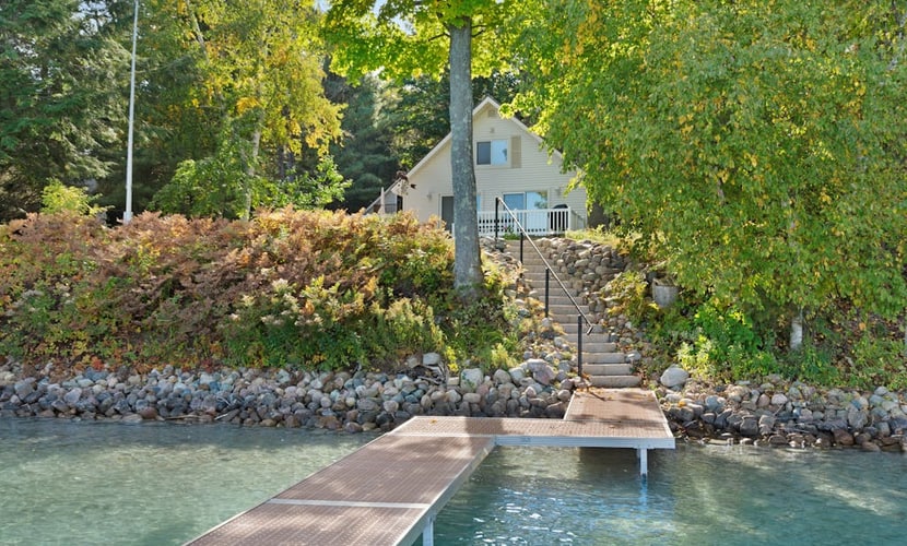 Cottage with lake views, private dock & firepit - near public boat launch