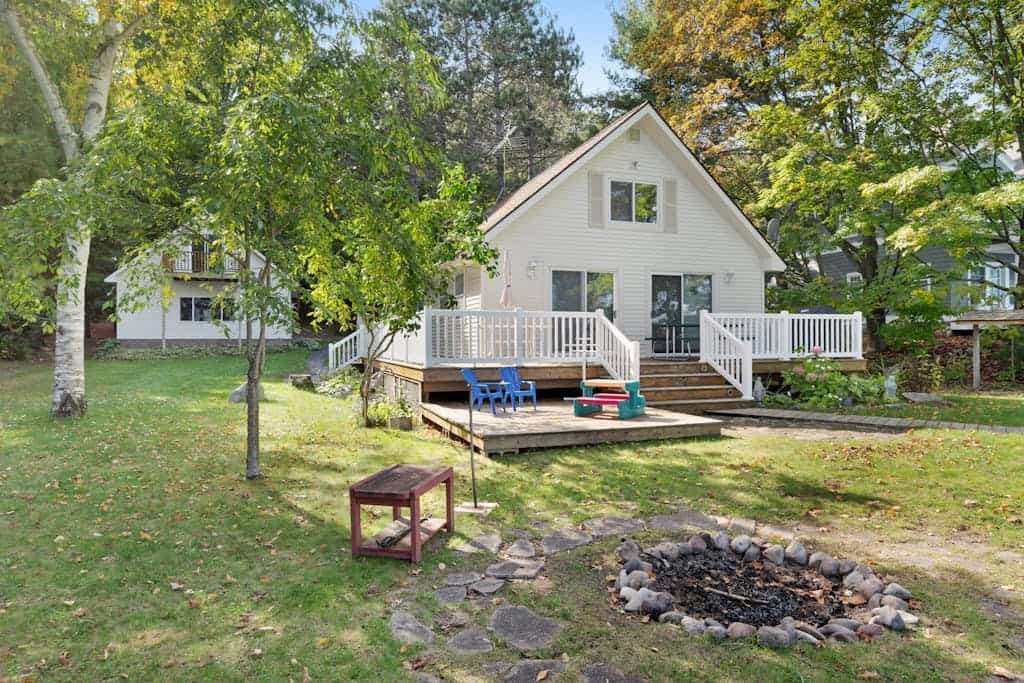 Cottage with lake views, private dock & firepit - near public boat launch