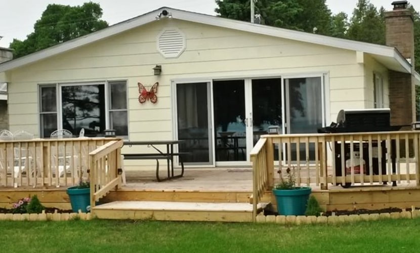 Remodeled, waterfront home on Portage Lake with dock & firepit - 2 dogs OK