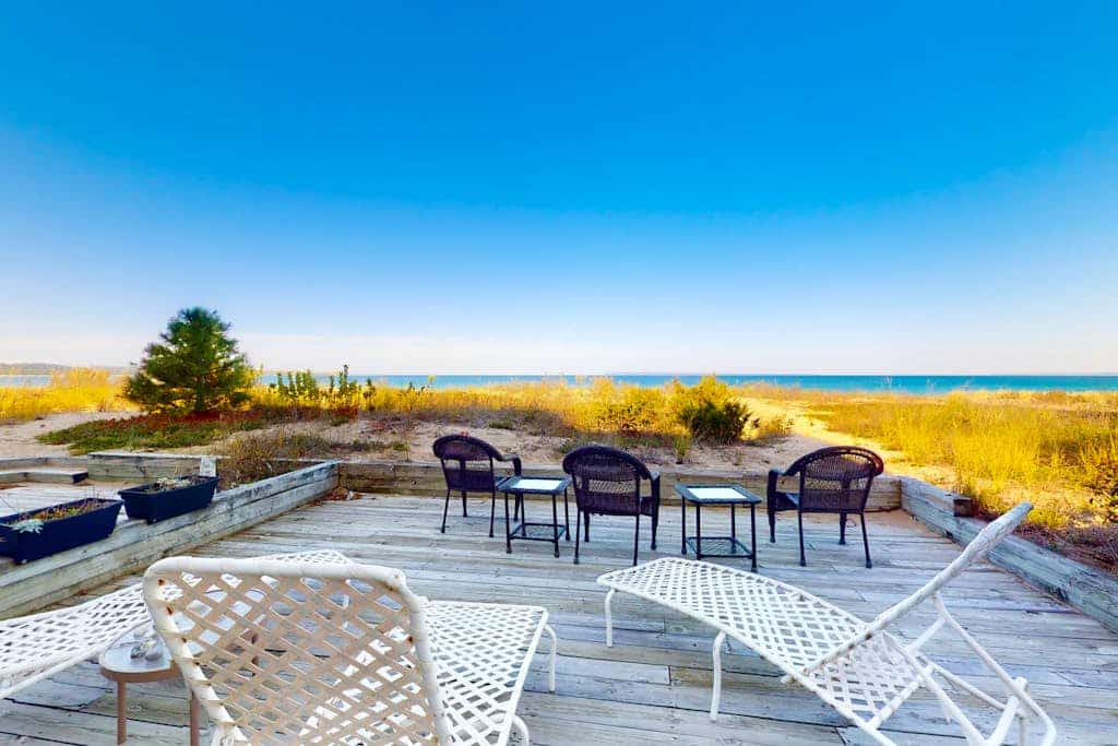 Lower-level beachfront condo with deck, fireplace, washer/dryer, central AC