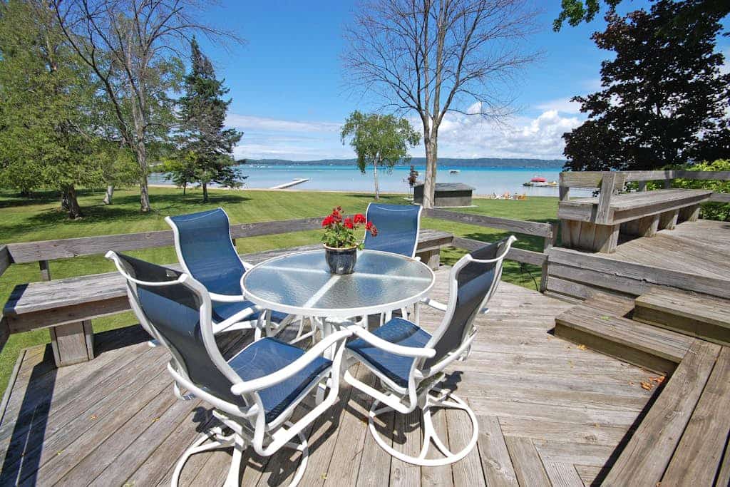 Lakefront cottage with a deck, grill, firepit, dock & partial AC