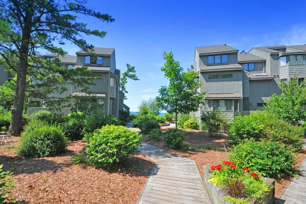 Lakefront condo with deck, gorgeous view, fireplace, & W/D