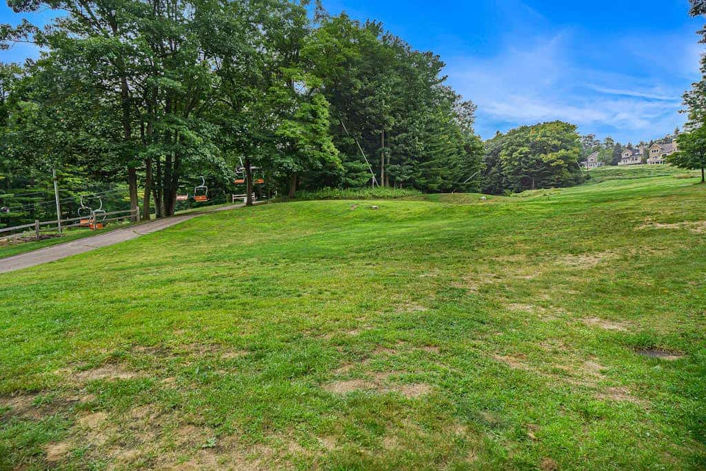 Two-story home with a patio, sunroom, balcony, & washer/dryer access