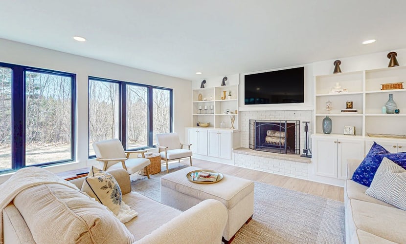 Modern Home in the woods w/ a large patio, gas grill, & near the lake