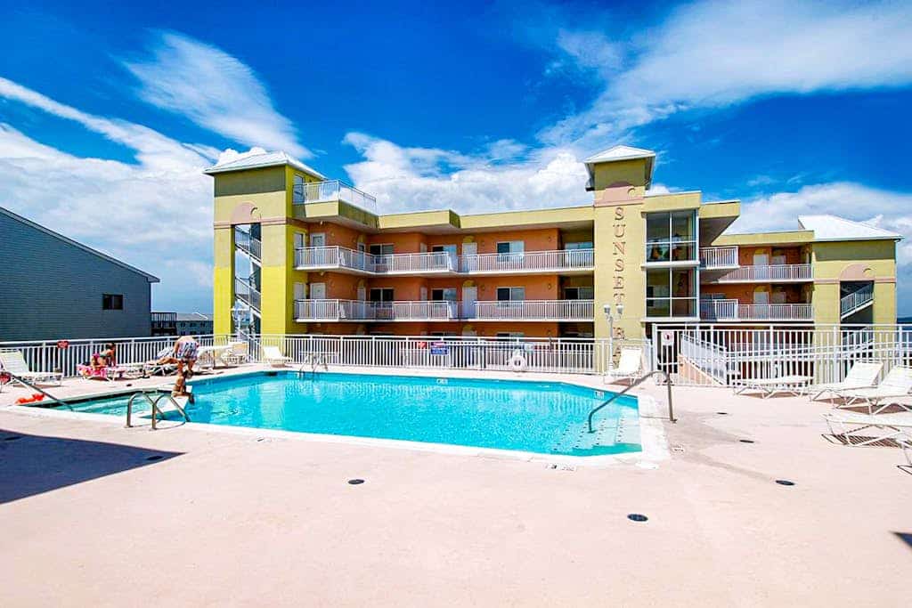 Midtown OC Getaway • Balcony Views • Pool + Dock • 1 Block to the Beach