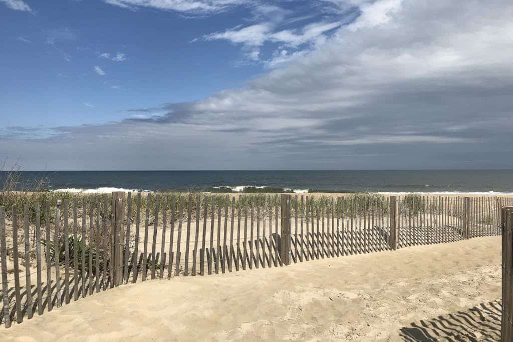 3rd-floor condo near the beach with balcony, partial ocean views, & central AC