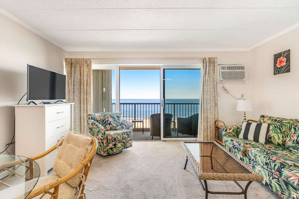 Oceanfront condo with water-view balcony, outdoor pool, washer/dryer & AC