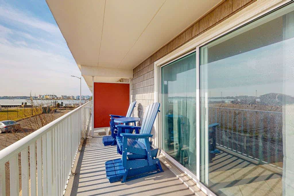 First-Floor Condo w/Private Balcony, Free WiFi, W/D, Central A/C, & Shared Pool