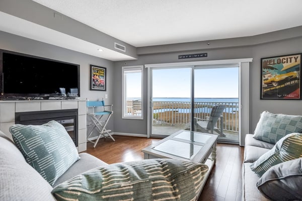 3rd-floor condo w/bay views, private balcony, free WiFi, W/D, and near the beach