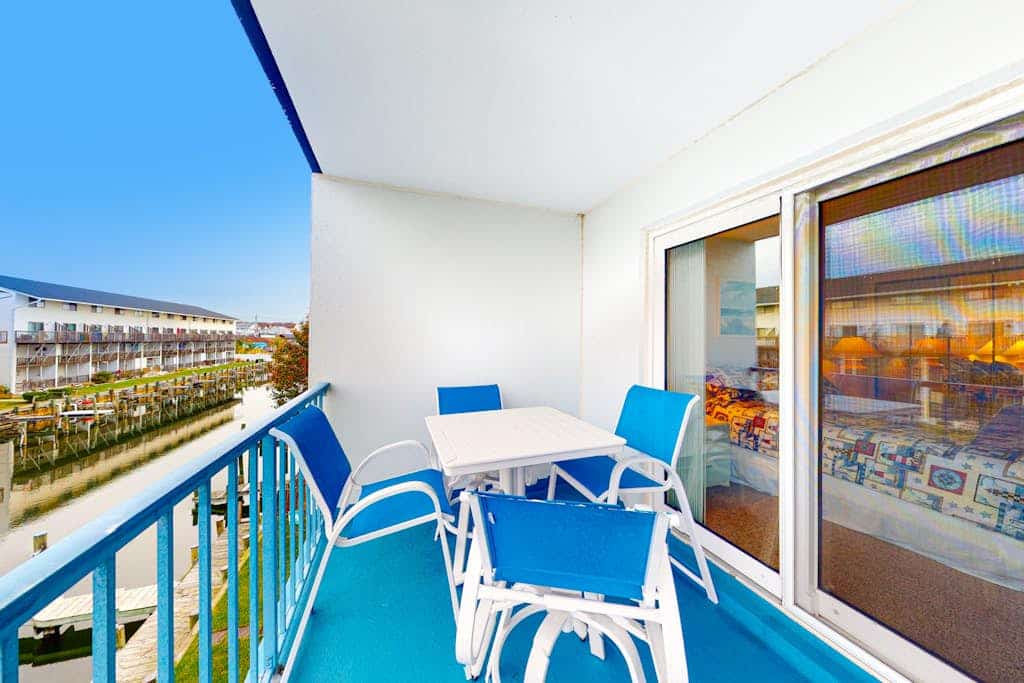 Canal-Front Condo w/Shared Outdoor Pool, Private Balcony, W/D, Free WiFi, A/C
