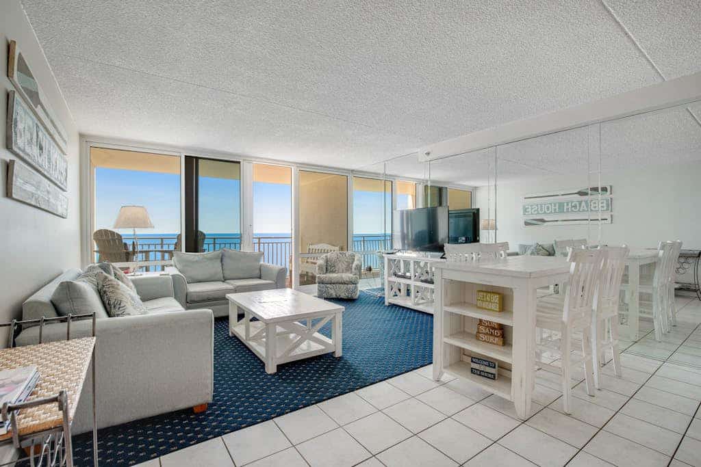 Beachfront condo with balcony, A/C, pool, sauna, & game room