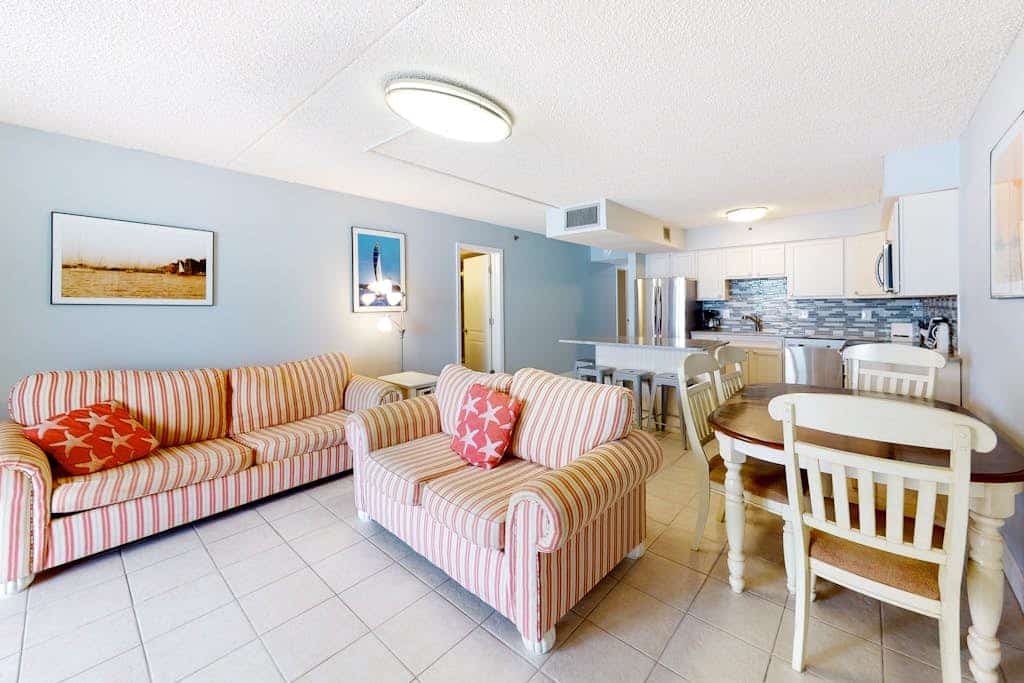 Beachfront condo with balcony, pools, sauna, gym, & game room