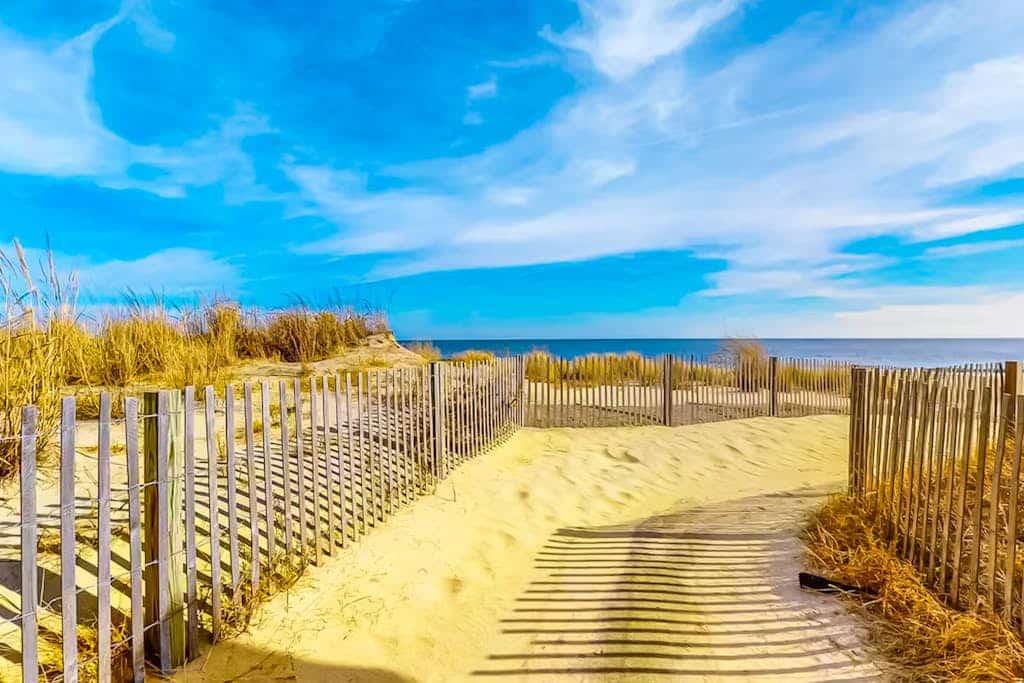 Renovated oceanfront home with sunrise views, large balcony, pool & beach access