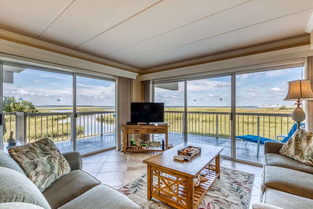 Condo Steps Away to the Beach w/Bayfront Views, a Shared Hot Tub & Pool