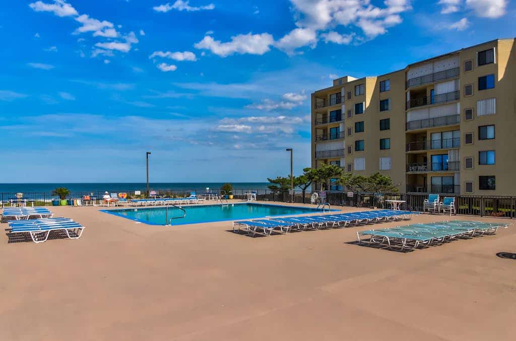 Oceanview condo with private balcony, shared pool access - walk to the beach