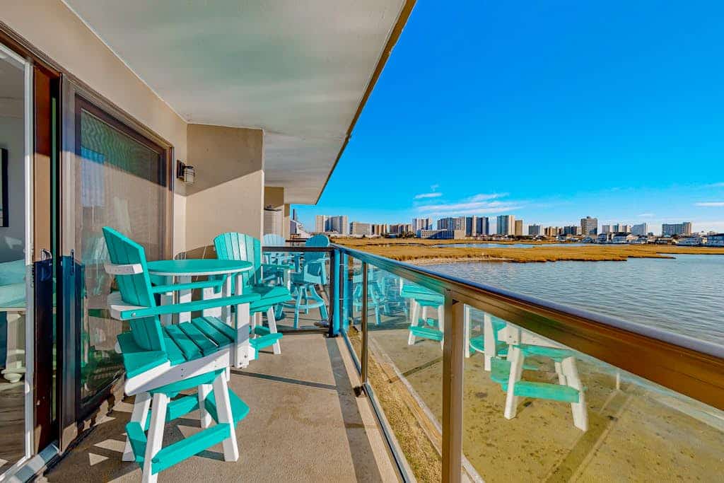 Waterfront condo near the beach with bay view, pool, tennis, & balcony