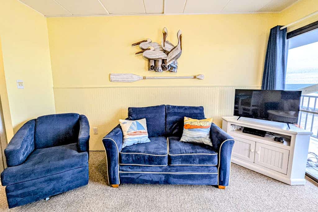 Second-floor, ocean-view condo with beach views, pool access, washer/dryer & AC