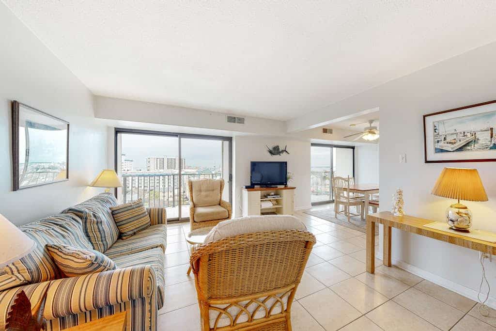 Beautiful newly updated water-view condo with pool, sundeck, & gym
