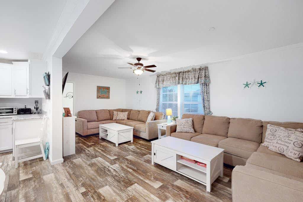 Beachy bayside home in quiet neighborhood with patio, central AC, pool, & tennis