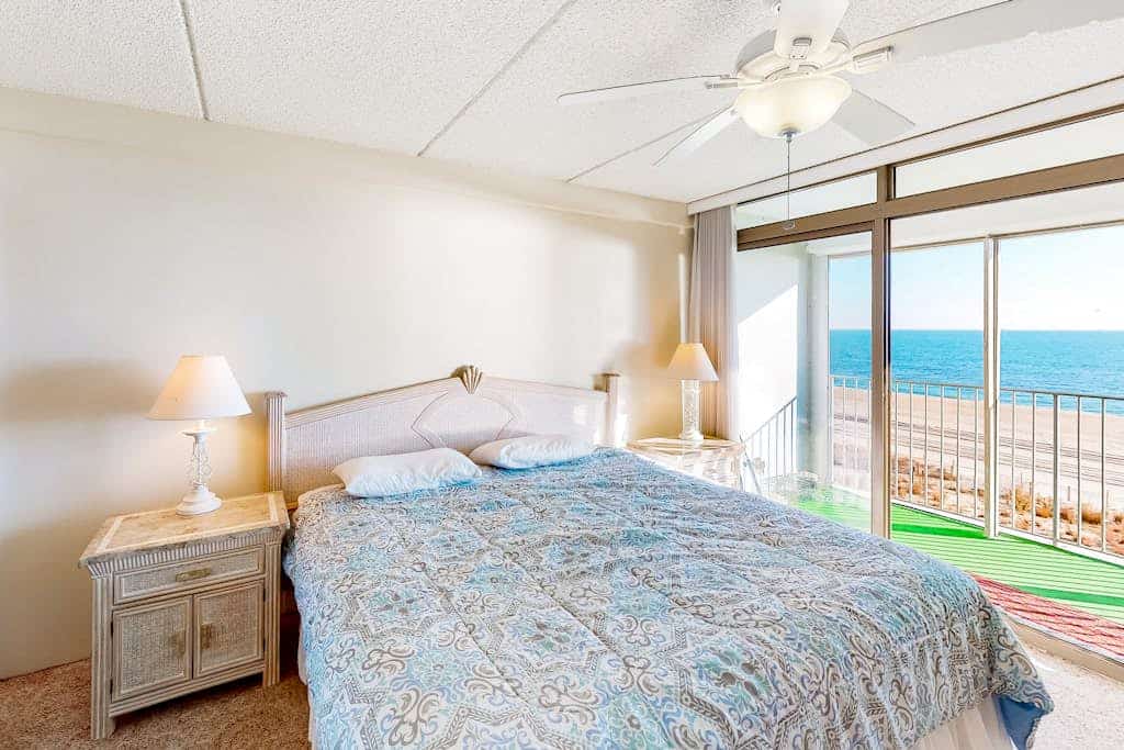 Open & charming home in oceanfront building with indoor pool, balconies, & AC
