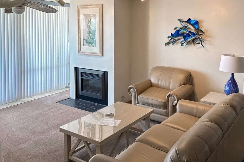 Recently updated beachfront condo with balcony, AC, pools, sauna, & game room