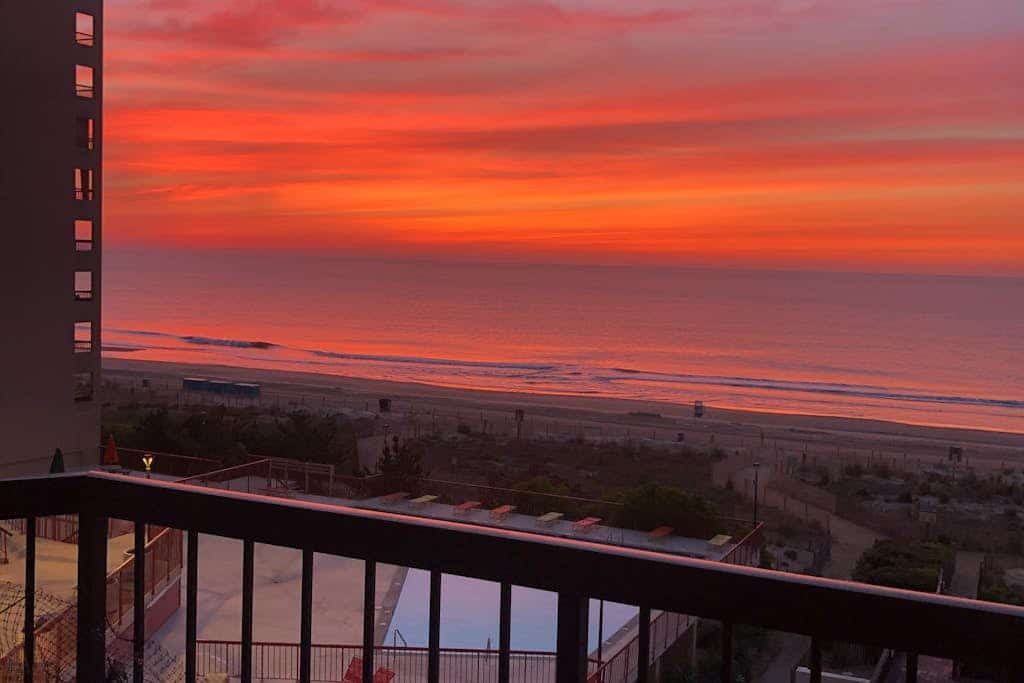 Oceanfront corner condo with spacious balcony, game room & W/D