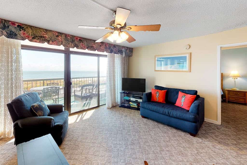 Convenient beachfront condo with balcony & views