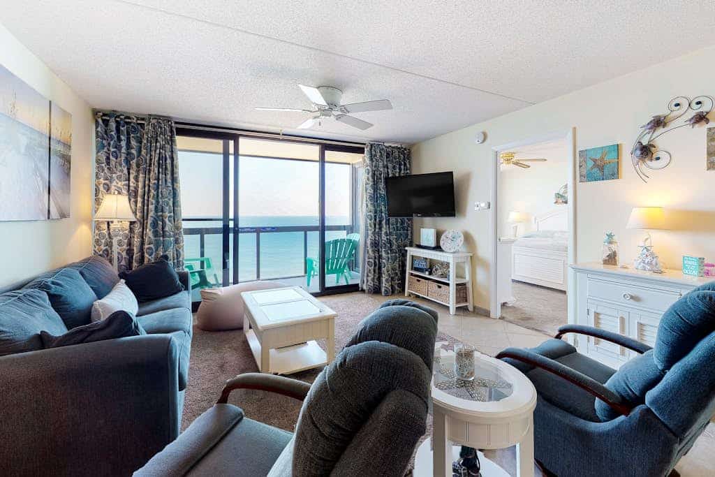 Budget-friendly beachfront condo with balcony, pools, gym & sauna