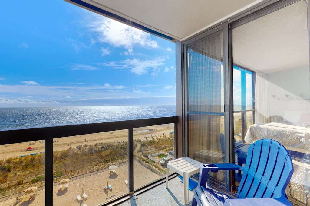 Classic, alluring beachfront condo with balcony, views, pools, gym & tennis