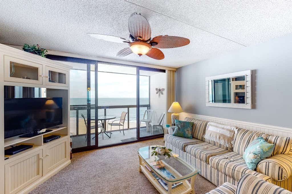 Great condo with angled ocean views, balcony, W/D & pools