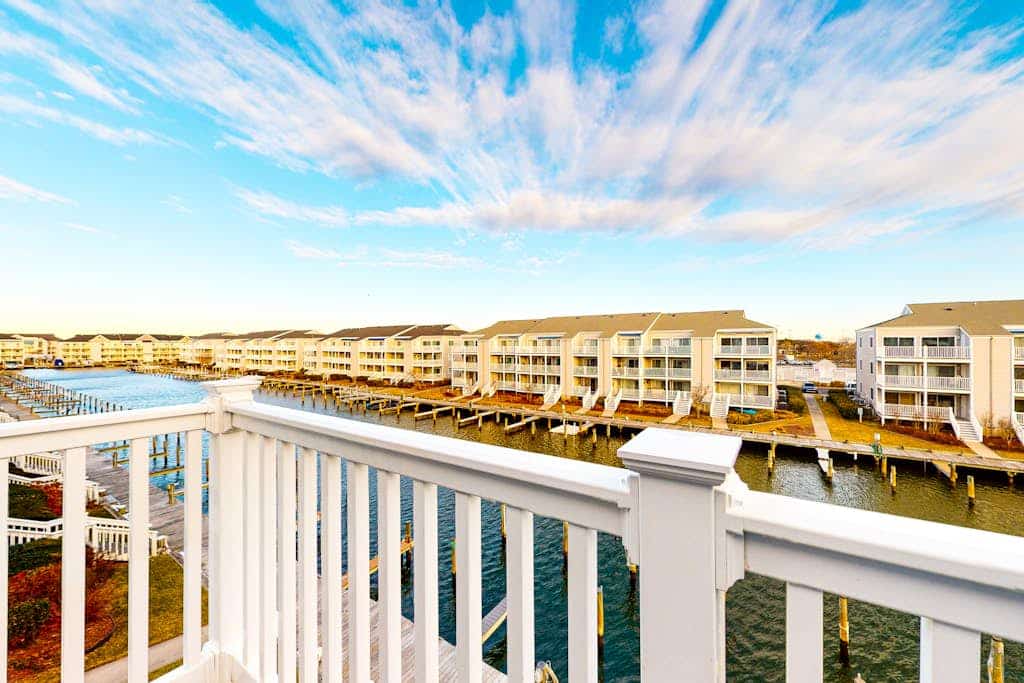 Canal-Front Condo w/ Water Views, Balcony, WiFi, AC, Laundry & Shared Pool