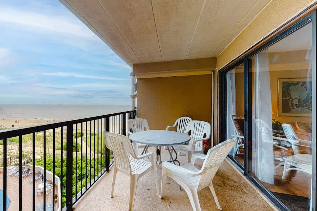 Oceanfront condo with balcony, outdoor pool,  & washer/dryer