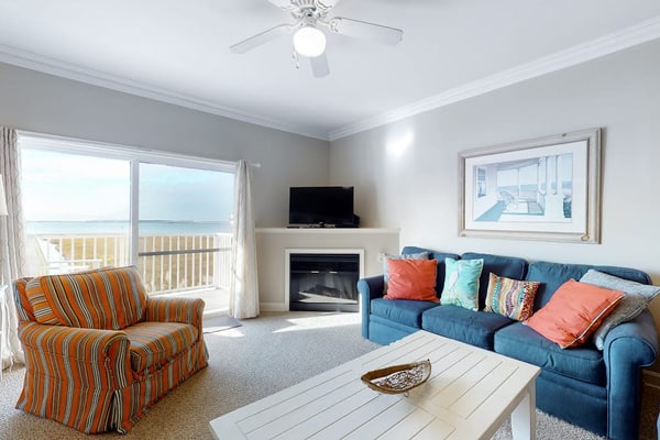 Roomy & convenient bayfront home with pool, central AC & balcony