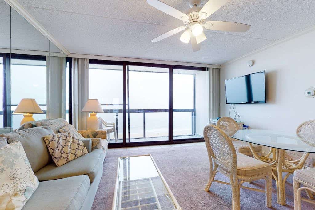 Pleasant beachfront condo with balcony, W/D, AC, pools, tennis & gym
