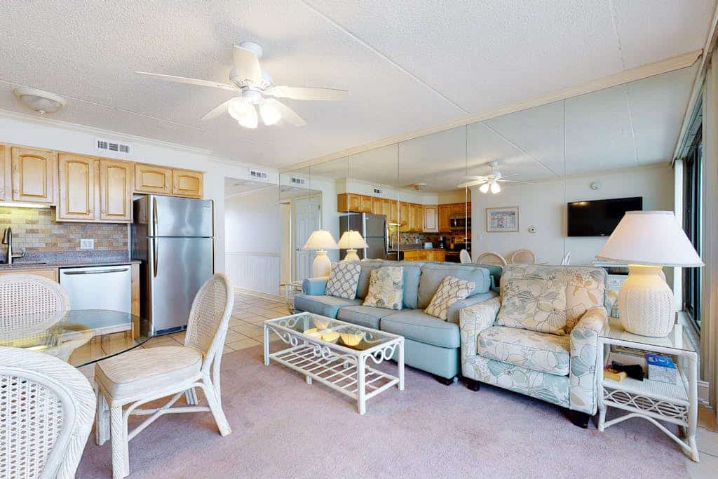 Pleasant beachfront condo with balcony, W/D, AC, pools, tennis & gym