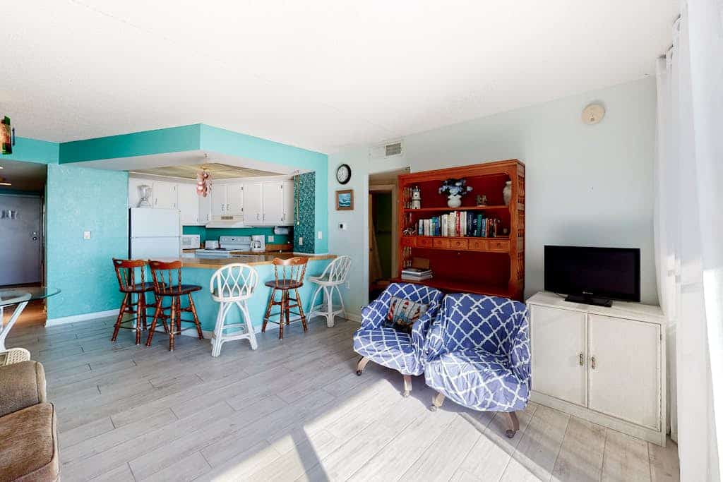 Unparalleled beachfront condo with balcony, pools, game room, gym & sauna