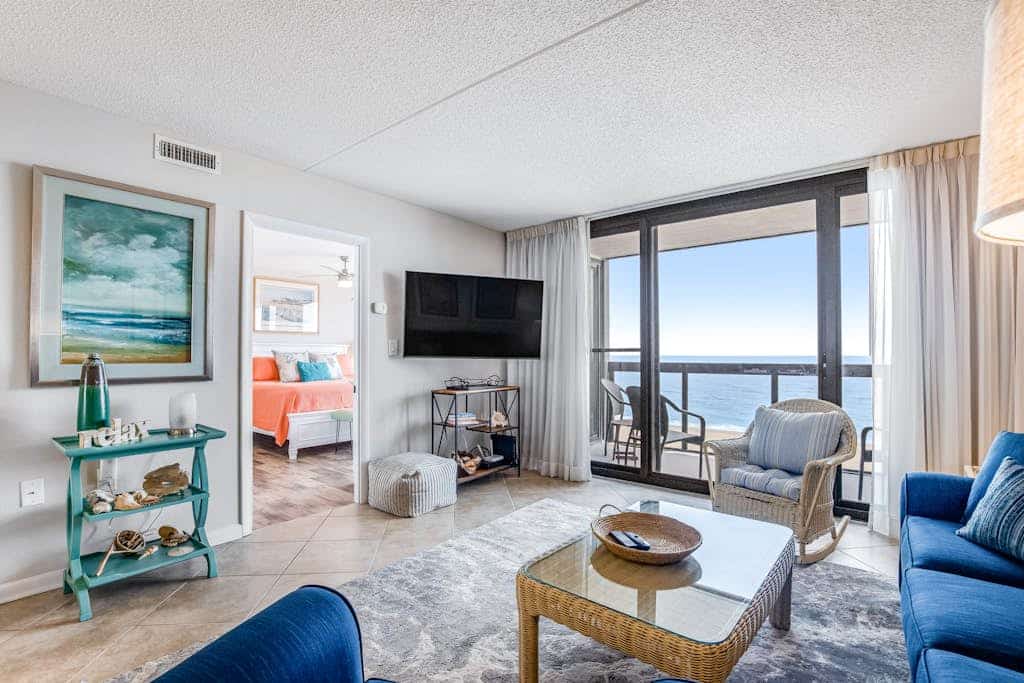 Wonderful beachfront condo with scenic balcony, AC, W/D, pools, gym, & tennis