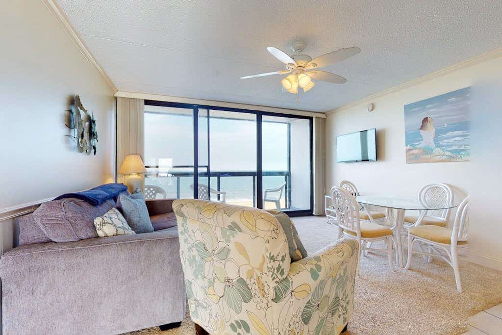 Stunning beachfront condo with beach-view balcony, pools, tennis & gym