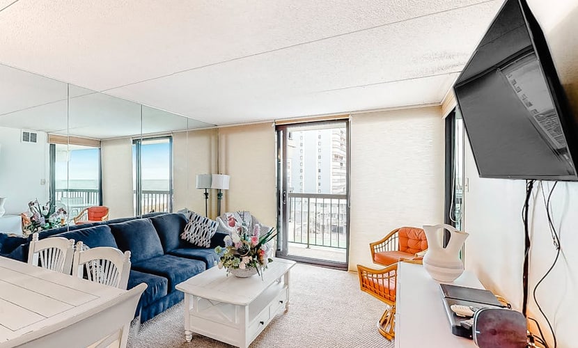 Alluring inviting condo with beach & tennis views, balcony, pools & AC