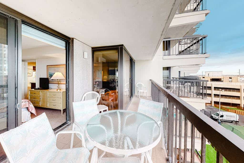 Alluring inviting condo with beach & tennis views, balcony, pools & AC
