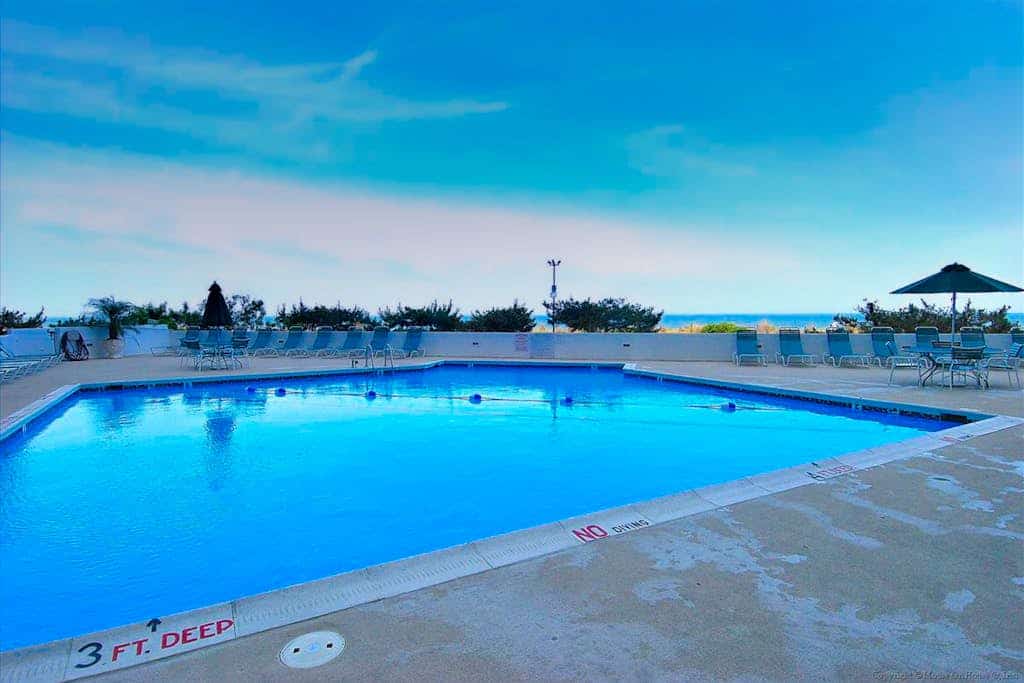 Air-Conditioned, Oceanfront Condo with Balcony, WiFi, Laundry & Shared Pool