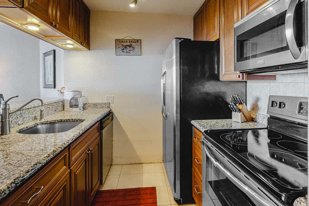 Oceanfront Condo with a Shaded Balcony, AC, WiFi & Shared Outdoor Pool