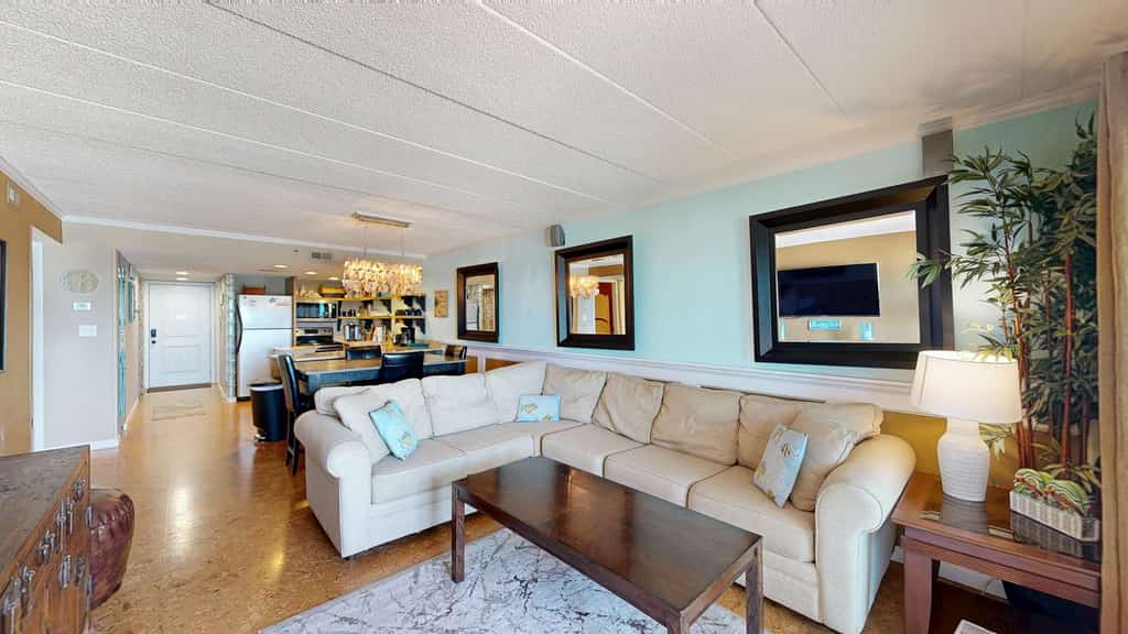 Delightful beachfront condo with balcony, sweeping views, pool, W/D & central AC