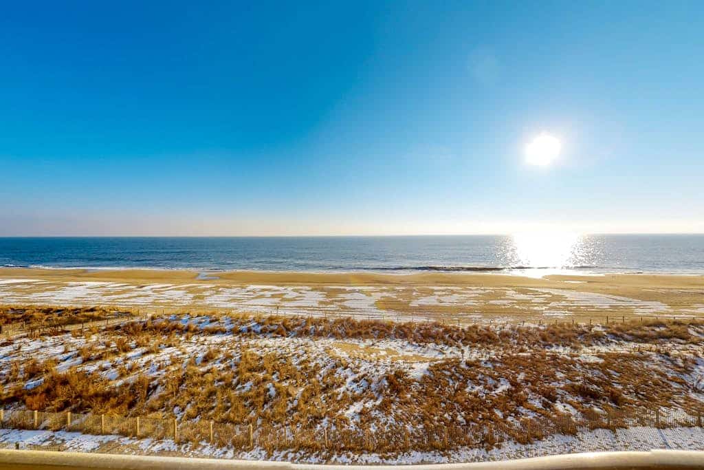 Air-Conditioned Condo Steps from the Beach w/ Balcony, WiFi, Washer/Dryer