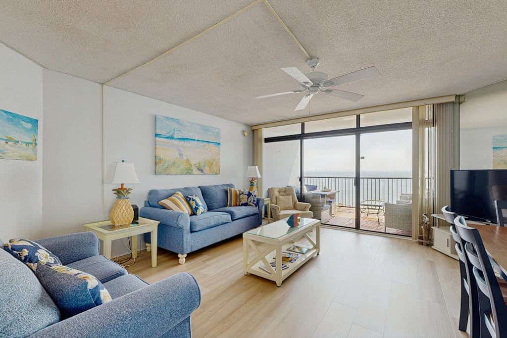 Bright, oceanfront condo with balcony, AC, laundry & outdoor pool
