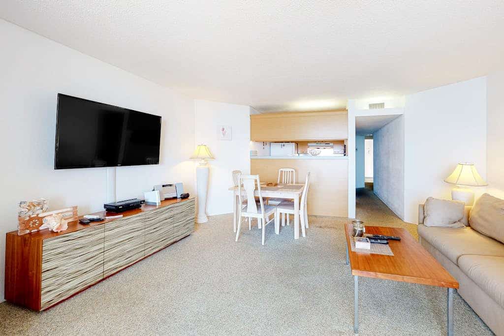 Oceanfront condo with ocean view, private W/D, central AC, and pool access